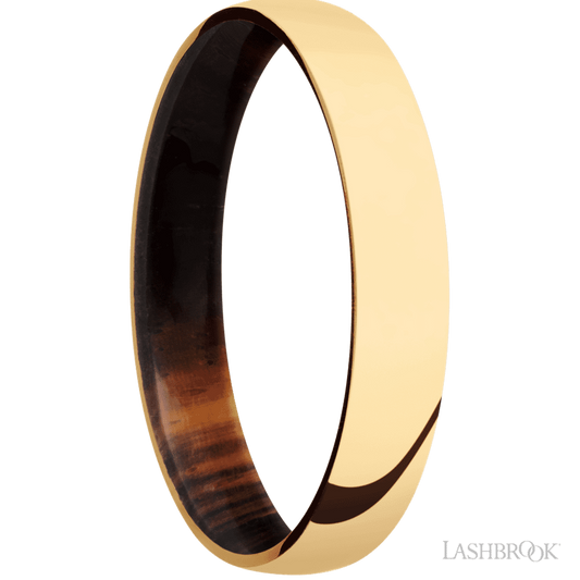 4 mm wide Domed 14K Yellow Gold band featuring a Cocobolo sleeve.