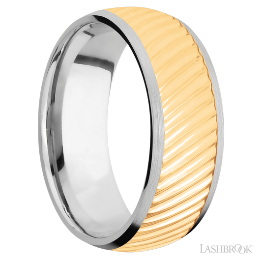 8 mm wide/Domed/14K White Gold band with one 6 mm Centered inlay of 14K Yellow Gold with a machined Ripple pattern.