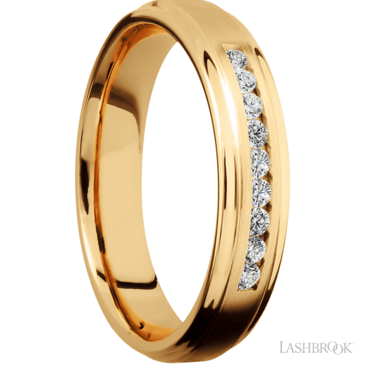 5 mm wide/Flat Grooved Edges/14K Yellow Gold band with an arrangement of 9, .03 carat Round Diamond stones in a Channel setting.
