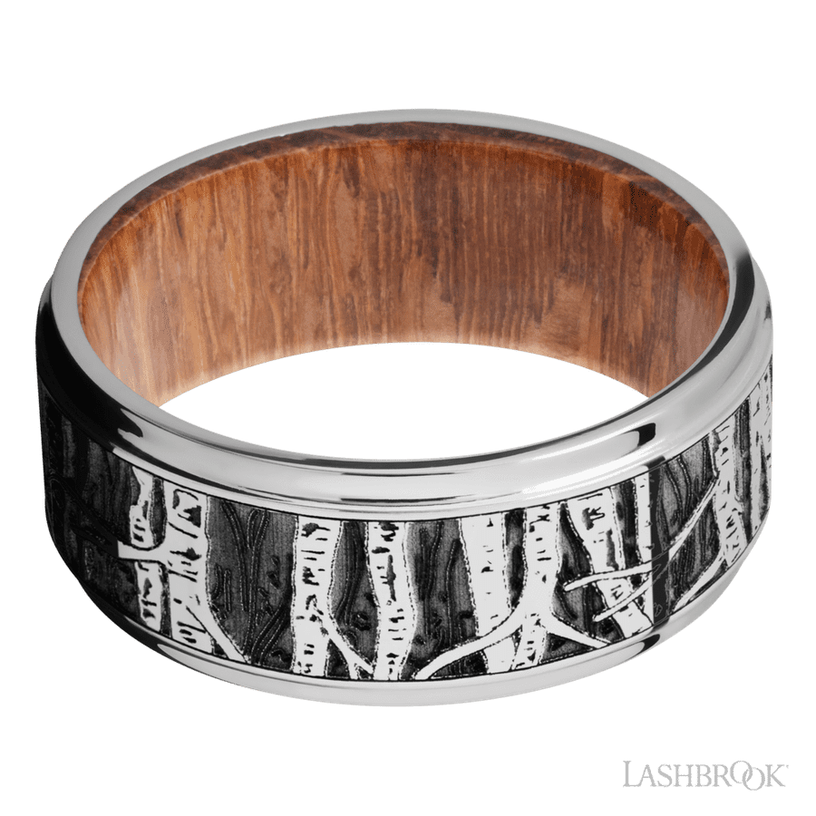 9 mm wide/Flat Grooved Edges/Cobalt Chrome band with a laser carved Aspen pattern also featuring a Leopard Wood sleeve.