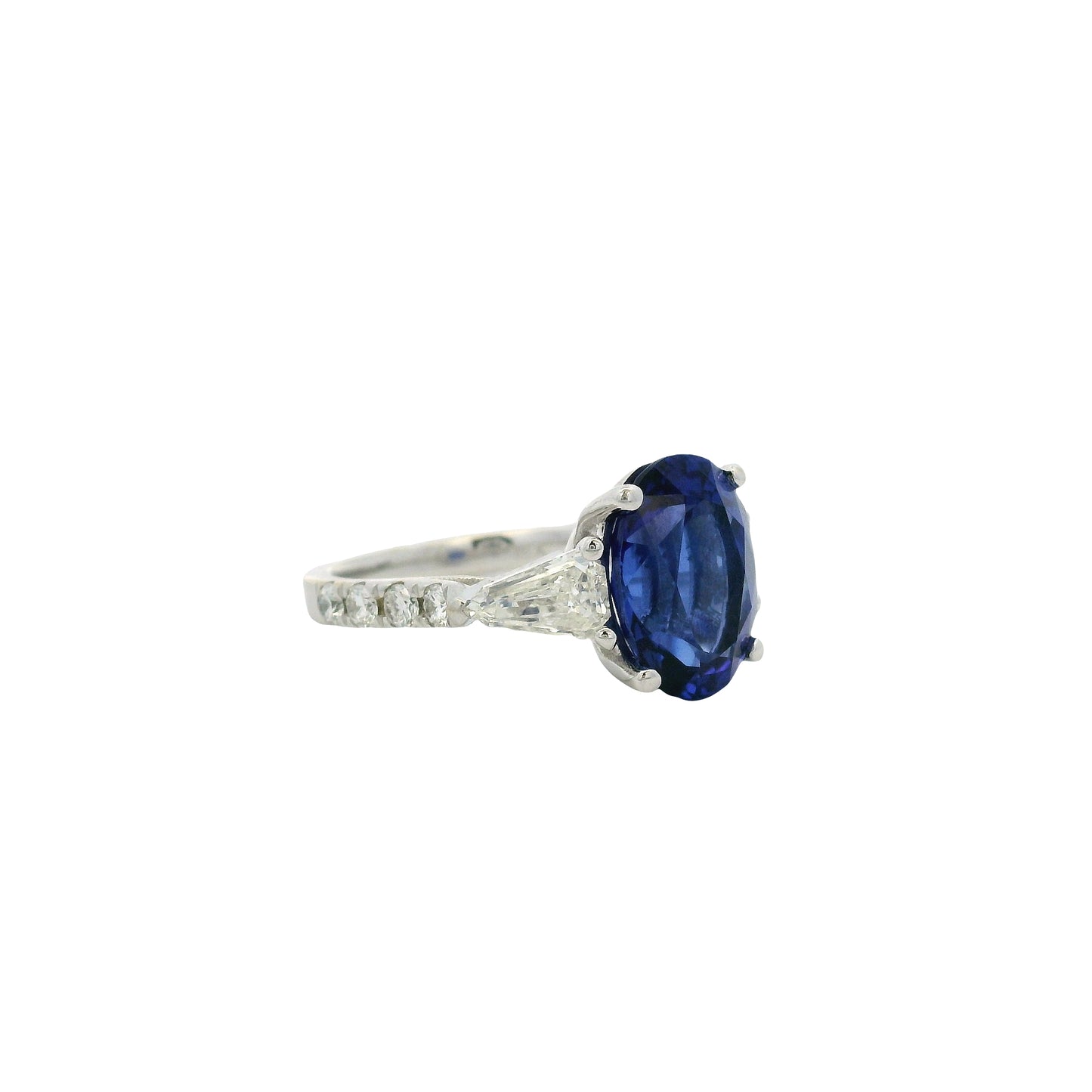 18k White Gold Oval Cut Tanzanite and Round and Tapered Baguette Diamond Cocktail Ring