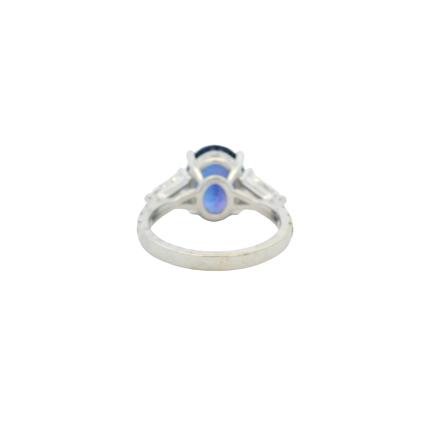 18k White Gold Oval Cut Tanzanite and Round and Tapered Baguette Diamond Cocktail Ring