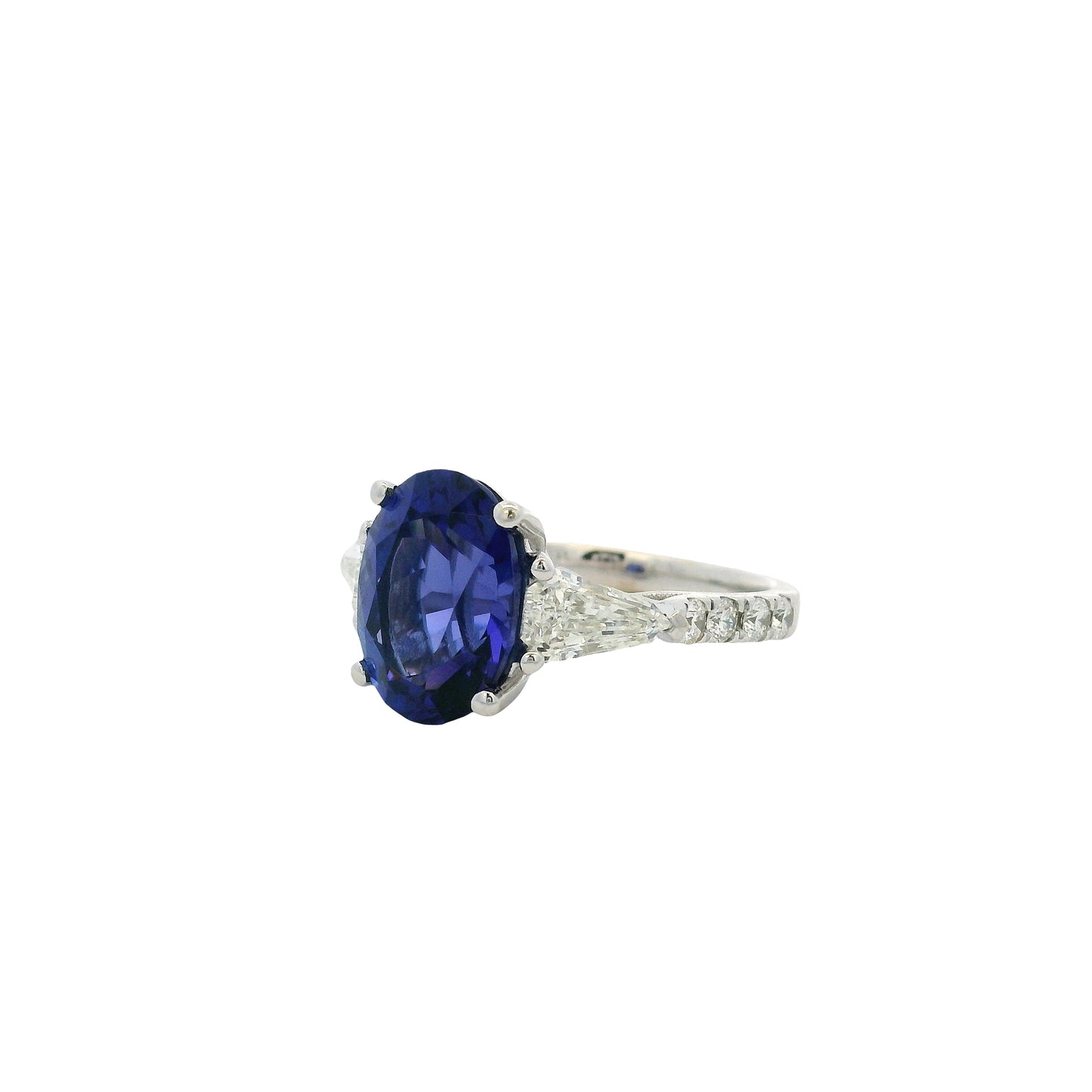 18k White Gold Oval Cut Tanzanite and Round and Tapered Baguette Diamond Cocktail Ring
