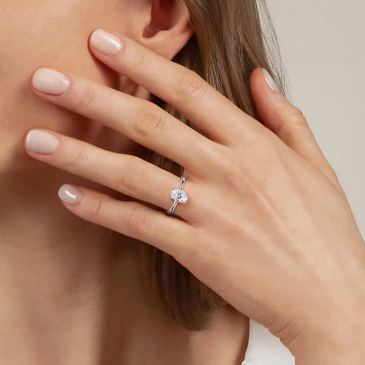 14K White Gold Oval Solitaire Diamond Engagement Ring — Gabriel & Co. ER16512O4W44JJ; center stone shown for illustration, not included