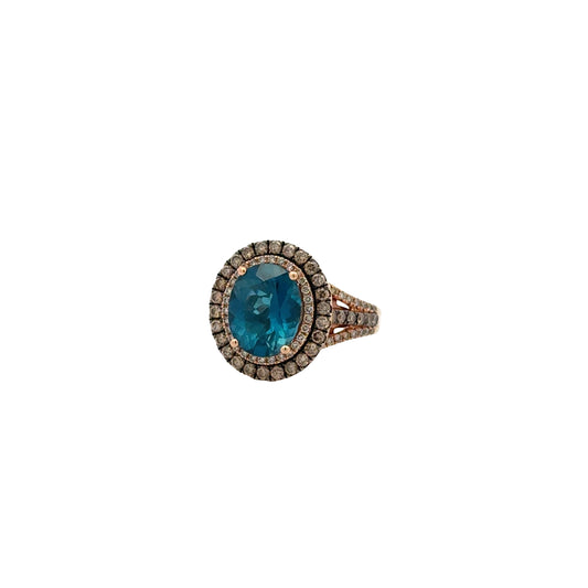 14k White and Rose Gold Le Vian Deep Sea Blue Topaz Oval Halo Ring — left three-quarter angle