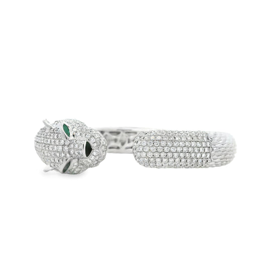 18k White Gold 0.31ctw Emerald and 10.57ctw Round Diamond Pavé Panther Hinged Bangle Bracelet — left three-quarter angle