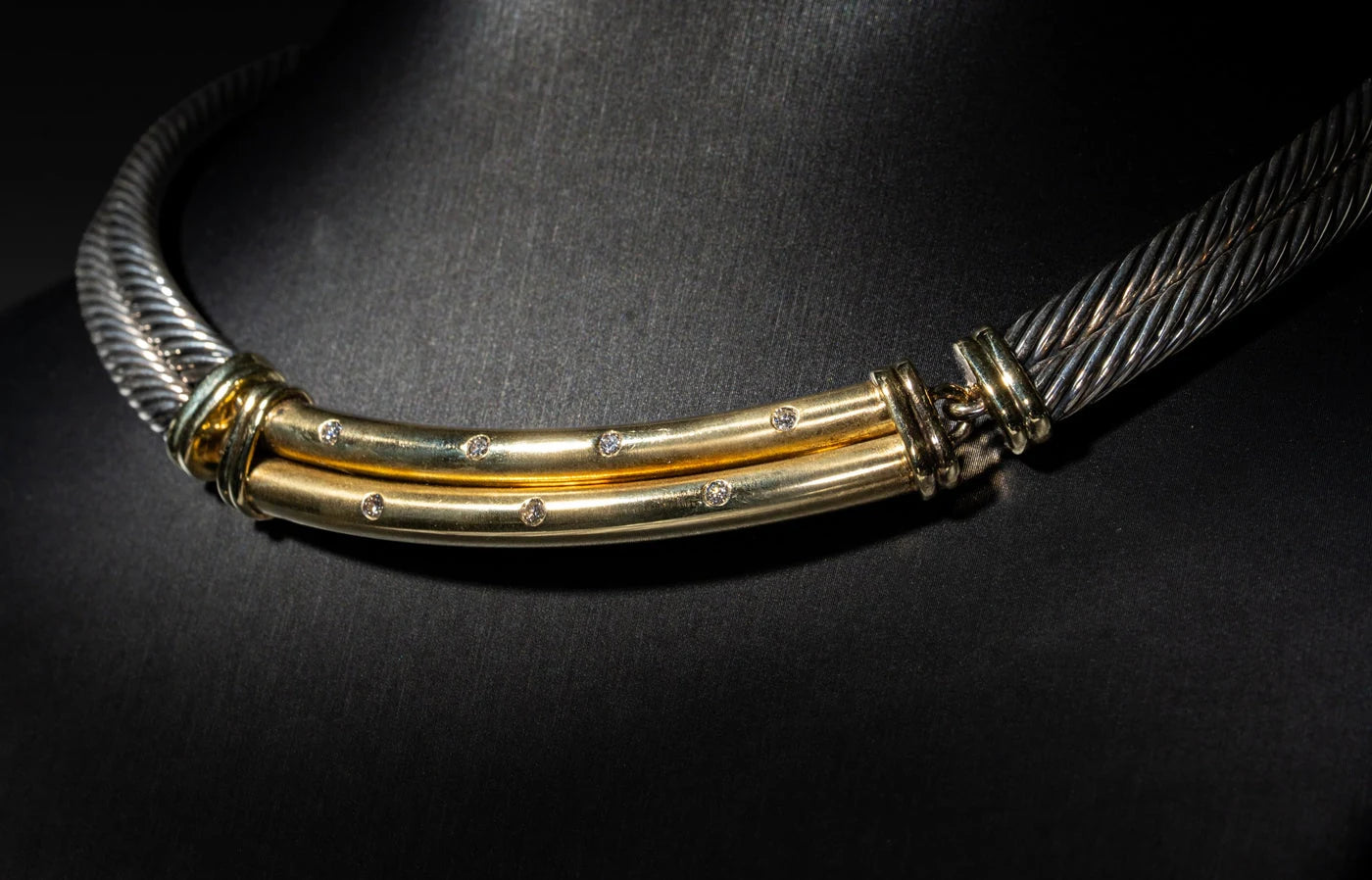 Two-tone cable jewelry with a polished gold-colored center detail