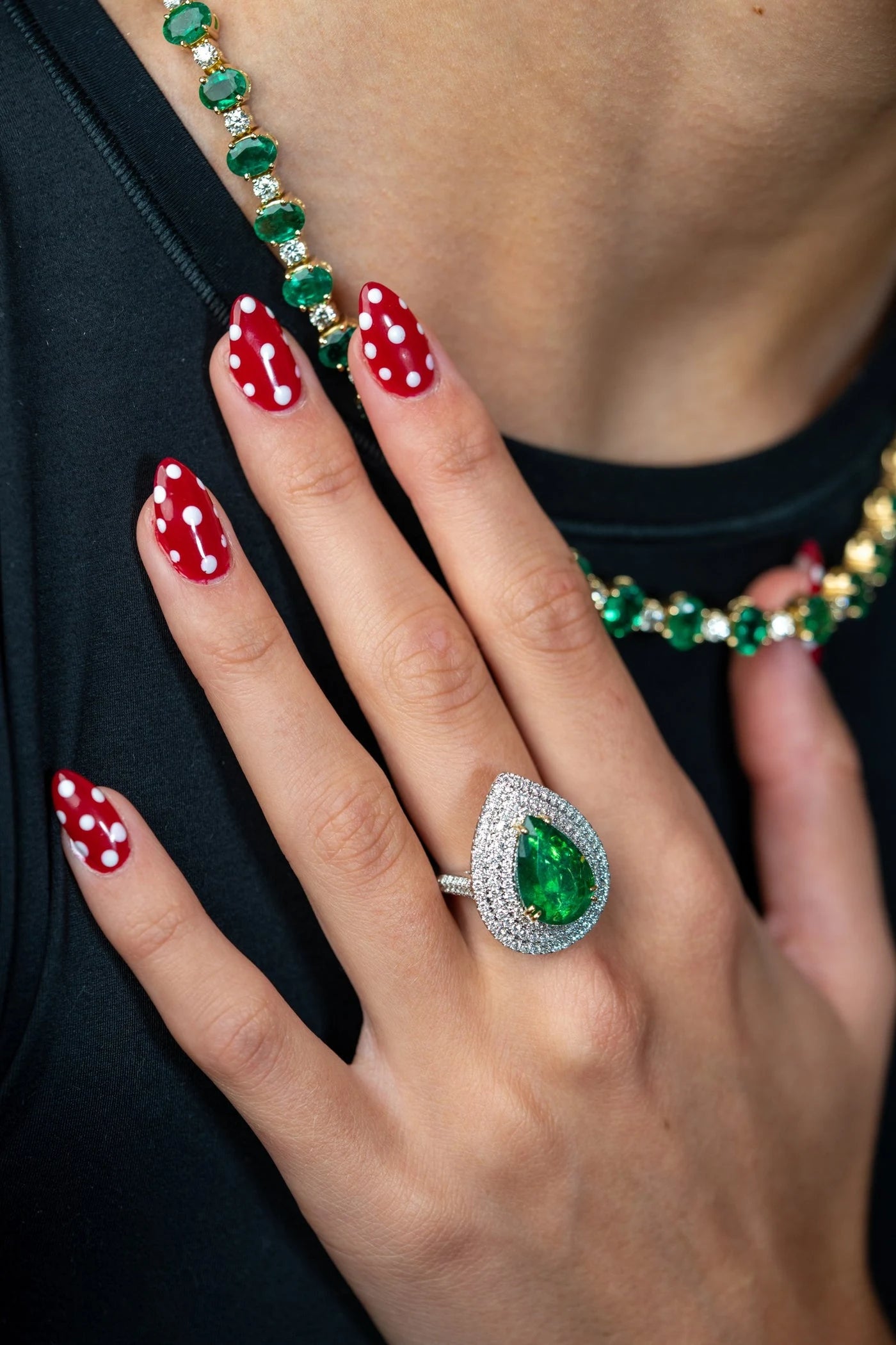 Green gemstone ring and necklace worn together