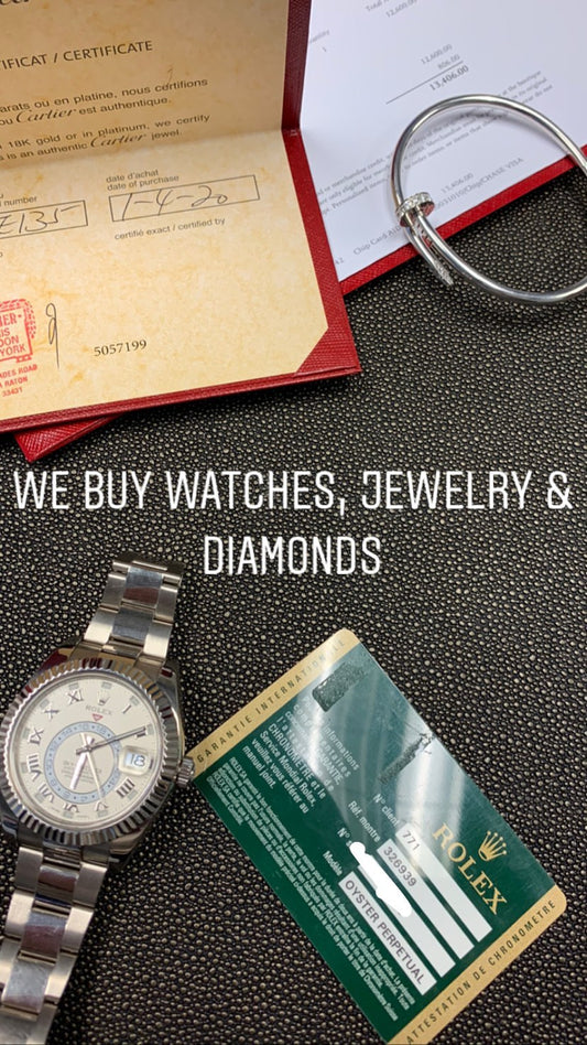 Archive buying notice with a watch, box and paperwork.
