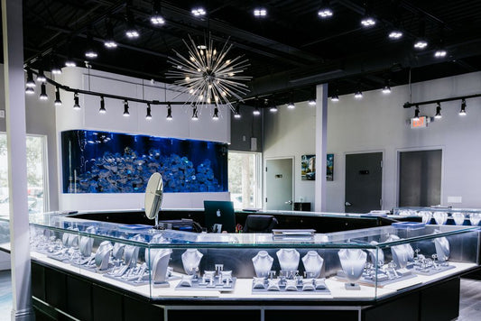 Jewelry display cases and an aquarium inside the showroom.