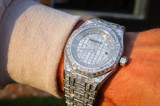 A watch with an Audemars Piguet dial and extensive stone setting; this is not a Rolex.