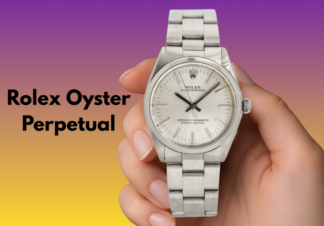 Hand holding a Rolex Oyster Perpetual silver watch.