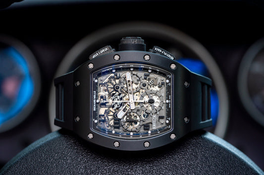 Dark cased Richard Mille chronograph with its movement visible through the dial.