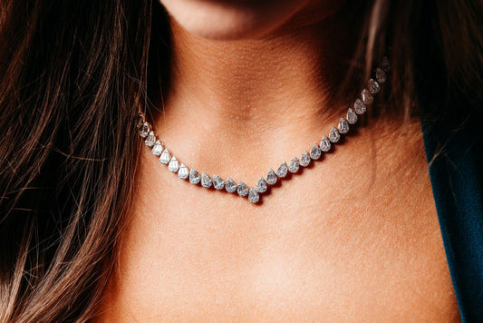A necklace with pear shaped clear stones.
