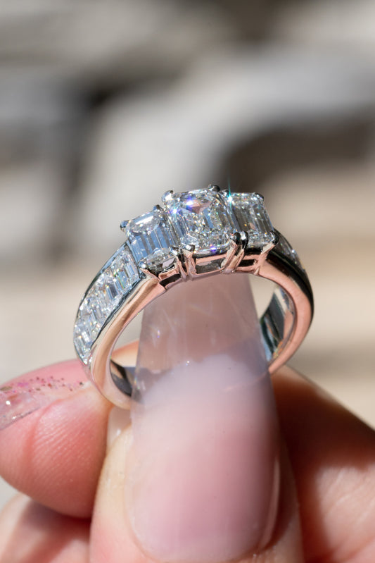 baguette-cut three-stone ring face