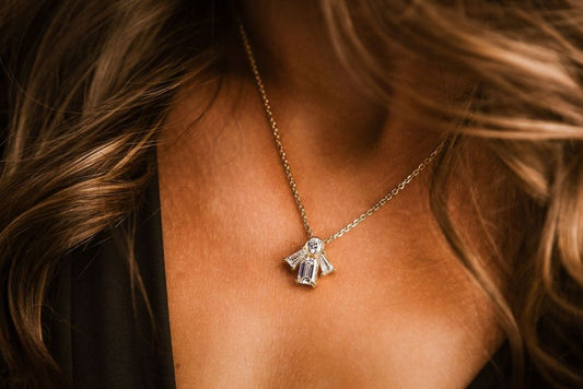 A pendant with round and rectangular clear stones.