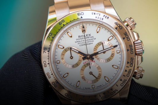 A close view of a Rolex Daytona dial; this is not a Submariner.