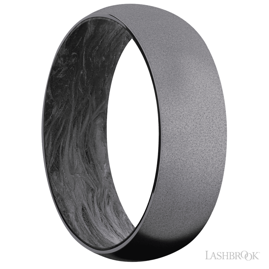 7 mm wide Domed Tantalum band featuring a Forged Carbon Fiber sleeve.