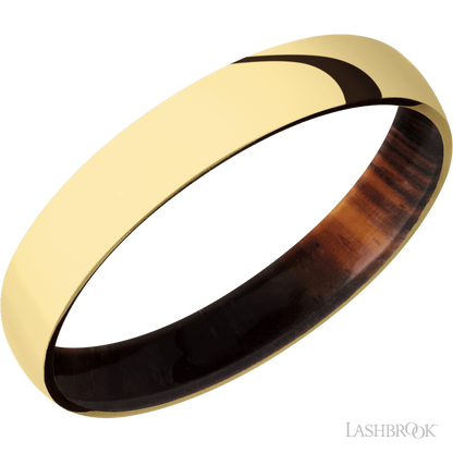 4 mm wide Domed 14K Yellow Gold band featuring a Cocobolo sleeve.