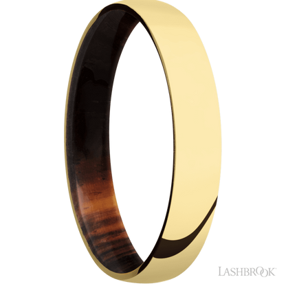4 mm wide Domed 14K Yellow Gold band featuring a Cocobolo sleeve.
