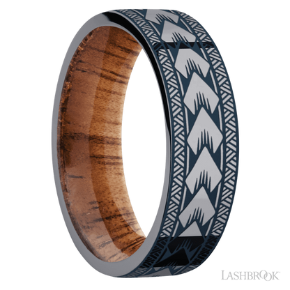 7 mm wide/Flat/Tantalum band with a laser carved Maori pattern also featuring a Koa sleeve.