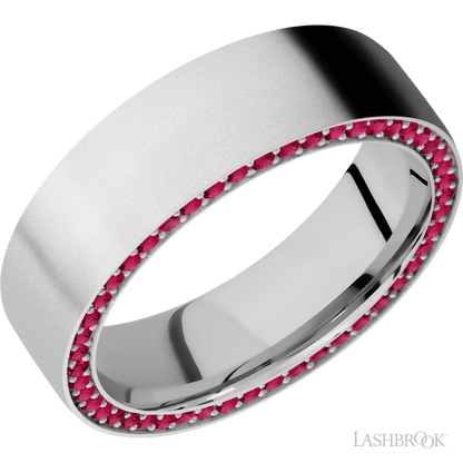 7 mm wide/Flat/14K White Gold band with a Side Eternity arrangement of .01 carat Round Ruby stones in a Bead Channel setting.