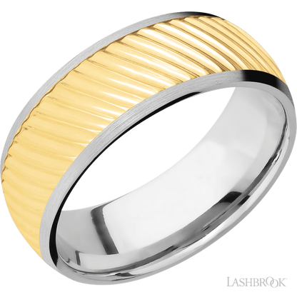 8 mm wide/Domed/14K White Gold band with one 6 mm Centered inlay of 14K Yellow Gold with a machined Ripple pattern.
