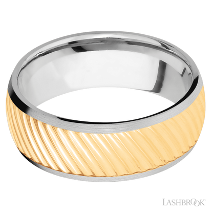 8 mm wide/Domed/14K White Gold band with one 6 mm Centered inlay of 14K Yellow Gold with a machined Ripple pattern.