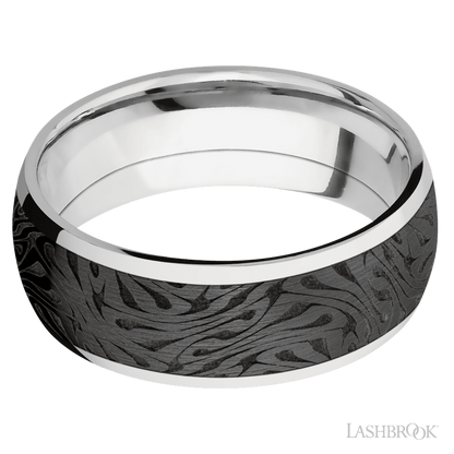 8 mm wide/Domed/Cobalt Chrome band with one 6 mm Centered inlay of Zirconium with a laser carved Escher 1 pattern.