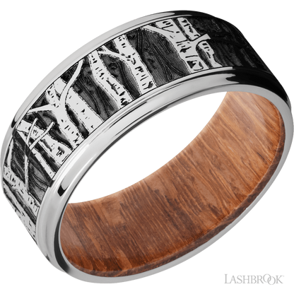 9 mm wide/Flat Grooved Edges/Cobalt Chrome band with a laser carved Aspen pattern also featuring a Leopard Wood sleeve.