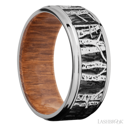 9 mm wide/Flat Grooved Edges/Cobalt Chrome band with a laser carved Aspen pattern also featuring a Leopard Wood sleeve.