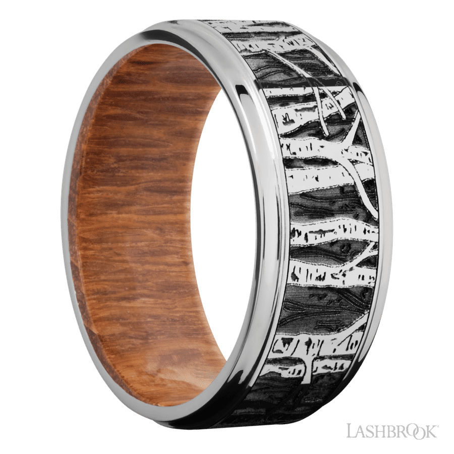 9 mm wide/Flat Grooved Edges/Cobalt Chrome band with a laser carved Aspen pattern also featuring a Leopard Wood sleeve.
