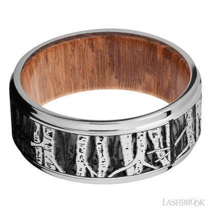 9 mm wide/Flat Grooved Edges/Cobalt Chrome band with a laser carved Aspen pattern also featuring a Leopard Wood sleeve.