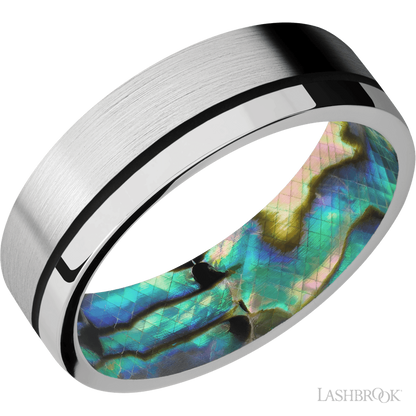 7 mm wide/Flat/14K White Gold band with one 0.5 mm Off Center inlay of Black also featuring a Abalone sleeve.