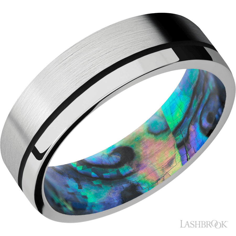 7 mm wide/Flat/14K White Gold band with one 0.5 mm Off Center inlay of Black also featuring a Abalone sleeve.