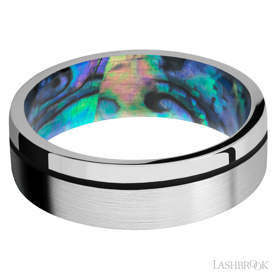 7 mm wide/Flat/14K White Gold band with one 0.5 mm Off Center inlay of Black also featuring a Abalone sleeve.