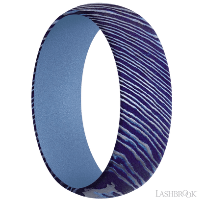 7 mm wide Domed Titanium Damascus band featuring a Crushed Orchid sleeve.