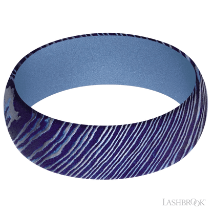 7 mm wide Domed Titanium Damascus band featuring a Crushed Orchid sleeve.