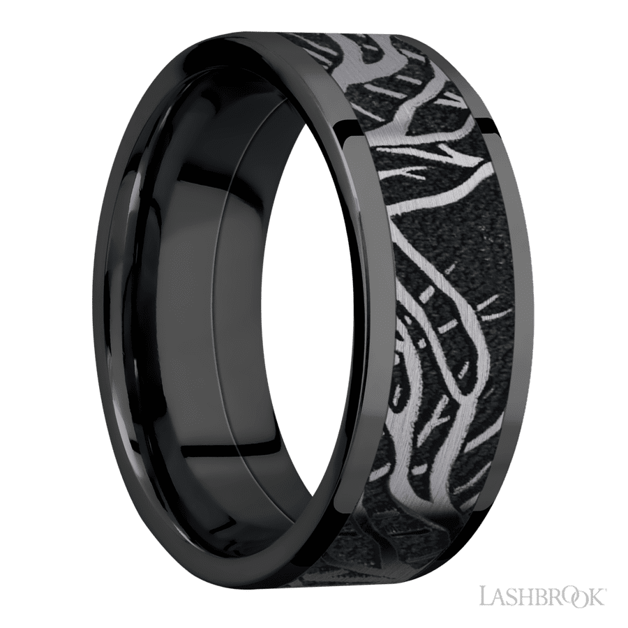 8 mm wide/Flat/Zirconium band with one 6 mm Centered inlay of Tantalum with a laser carved Branches pattern.