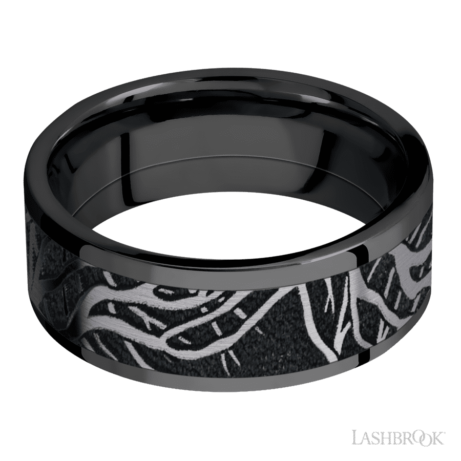 8 mm wide/Flat/Zirconium band with one 6 mm Centered inlay of Tantalum with a laser carved Branches pattern.