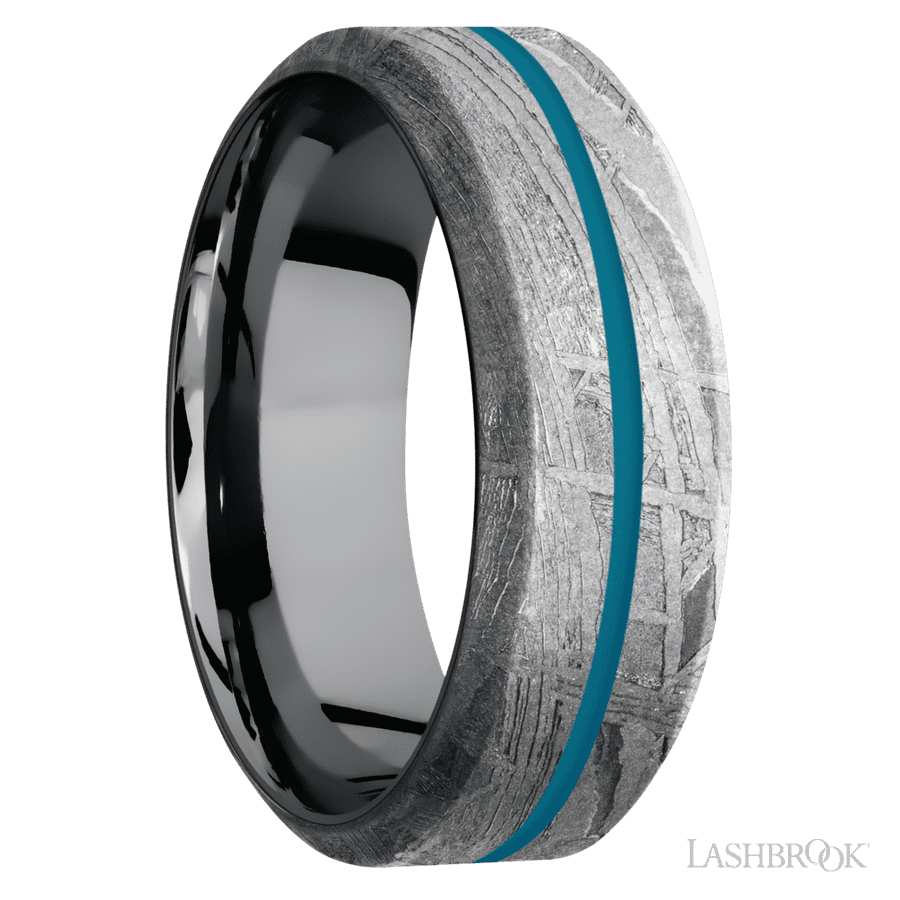 8 mm wide/High Bevel/Meteorite band with one 1 mm Centered inlay of Sea Blue also featuring a Tantalum sleeve.