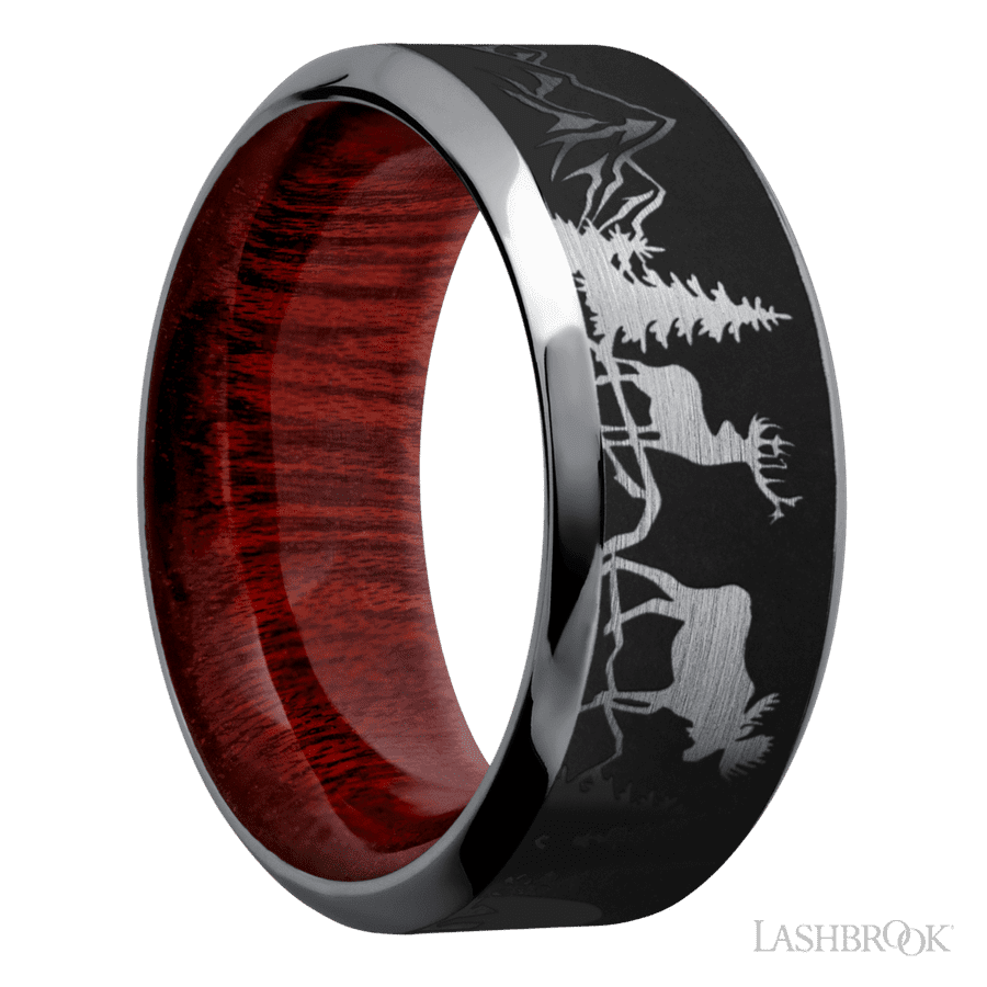 9 mm wide/High Bevel/Tantalum band with a laser carved Bear Moose Deer Mountain pattern also featuring a Blood Wood sleeve.