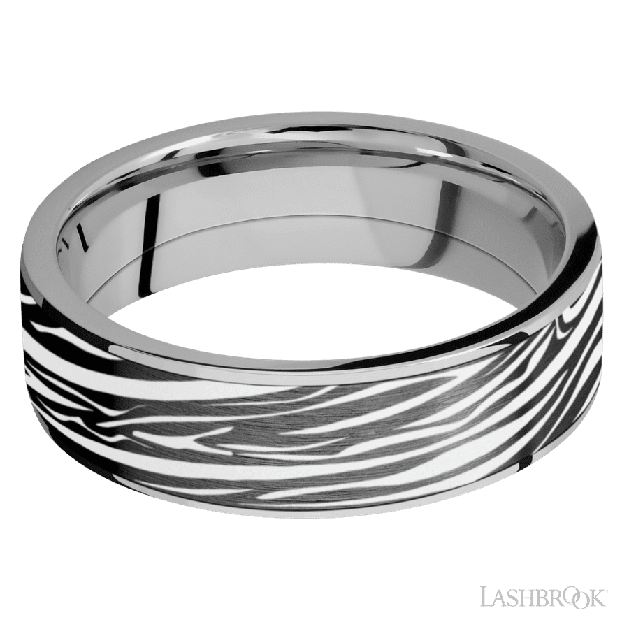 7 mm wide/Flat/Titanium band with one 6 mm Centered inlay of Zirconium with a laser carved Zebra pattern.
