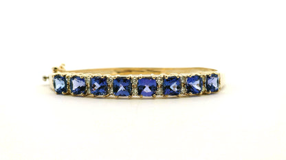 14k Yellow Gold 7.10ctw Tanzanite and 0.65ctw Round Diamond Bangle