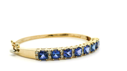 14k Yellow Gold 7.10ctw Tanzanite and 0.65ctw Round Diamond Bangle