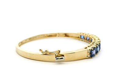 14k Yellow Gold 7.10ctw Tanzanite and 0.65ctw Round Diamond Bangle
