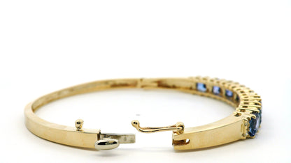 14k Yellow Gold 7.10ctw Tanzanite and 0.65ctw Round Diamond Bangle