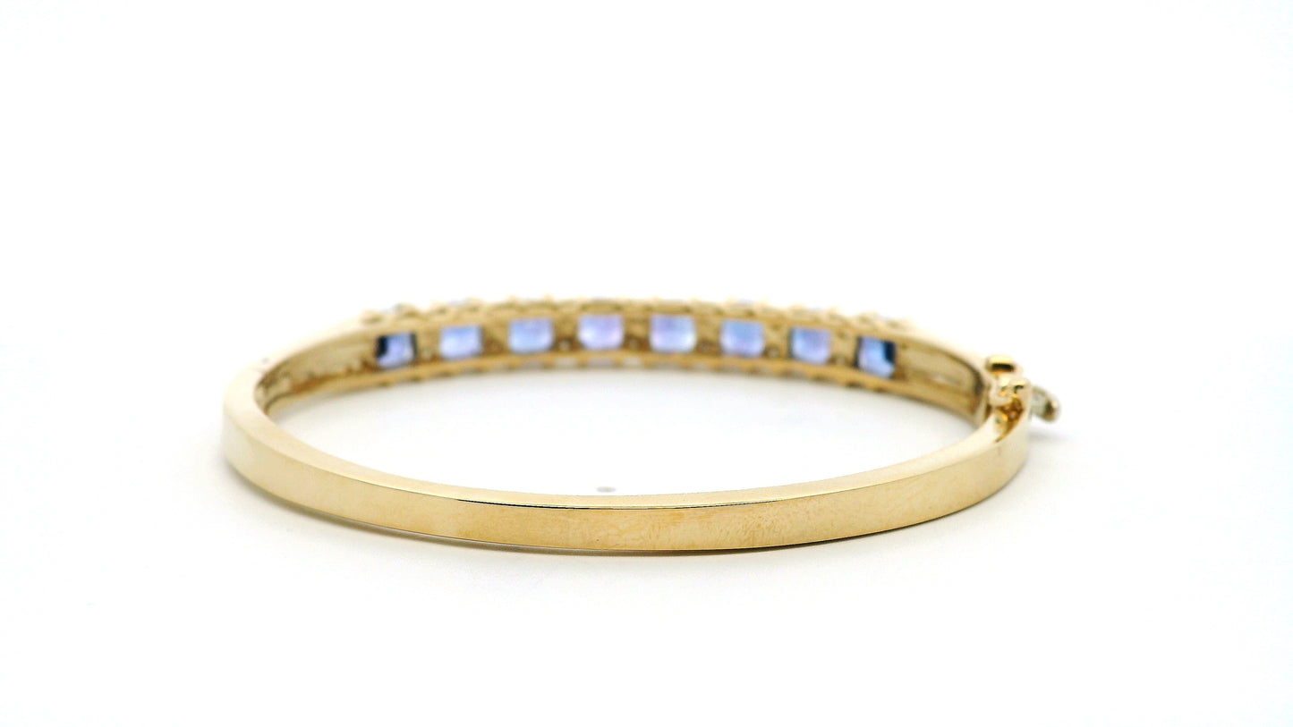 14k Yellow Gold 7.10ctw Tanzanite and 0.65ctw Round Diamond Bangle