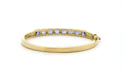 14k Yellow Gold 7.10ctw Tanzanite and 0.65ctw Round Diamond Bangle