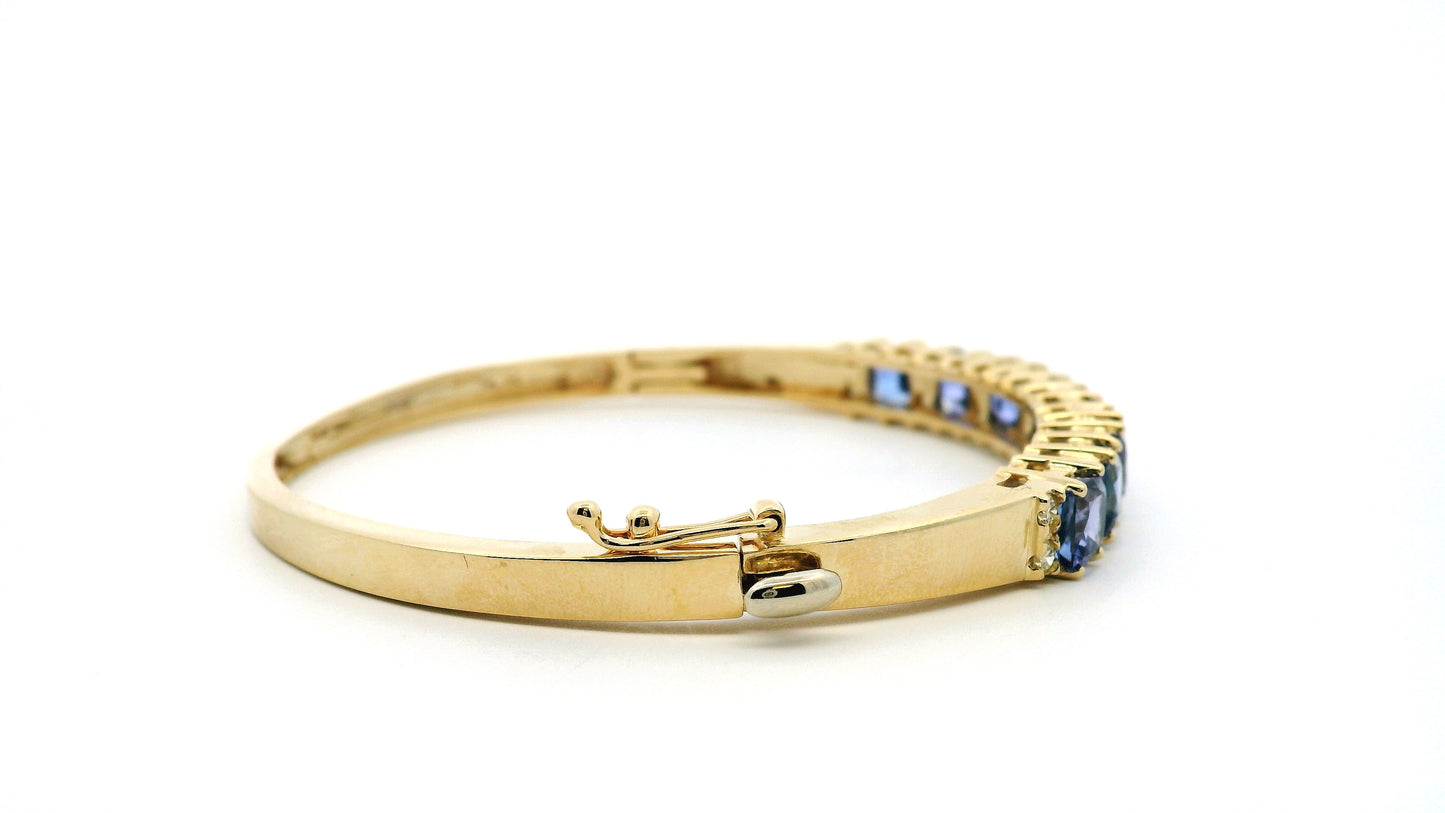14k Yellow Gold 7.10ctw Tanzanite and 0.65ctw Round Diamond Bangle